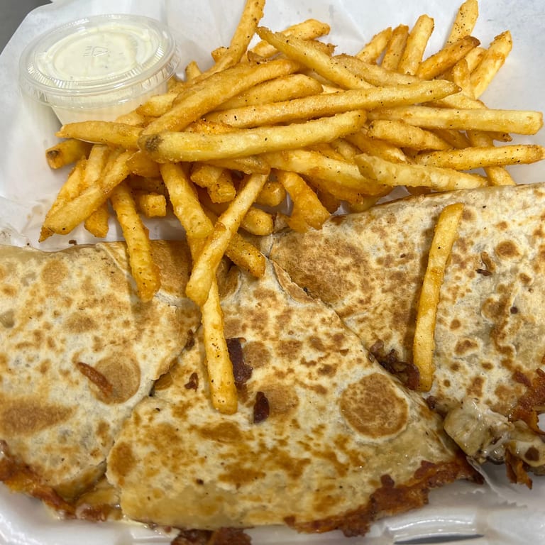Indulge in Our Quesadilla
